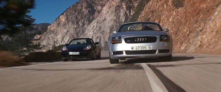 Audi TT Roadster and Porsche 911 Carrera Cabrio [996] cars in MISSION: IMPOSSIBLE II (2000)