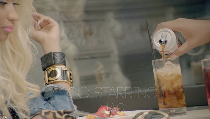 Chanel bracelet worn by Nicki Minaj and Pepsi can held by Nas in RIGHT BY MY SIDE by Nicki Minaj (2012)
