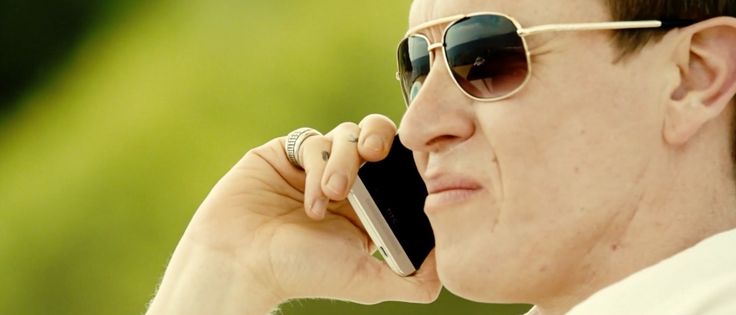 HTC mobile phone used by and Rocawear sunglasses worn by Sam Spruell in TAKEN 3 (2014)