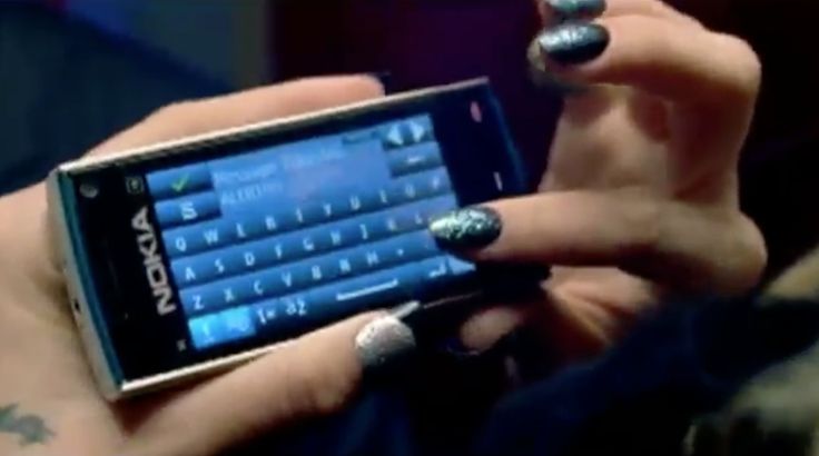 Nokia X6 mobile phone used by Ke$ha in BLAH BLAH BLAH (2010)