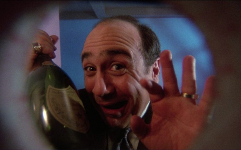 Dom Pérignon and Danny DeVito in Ruthless People (1)