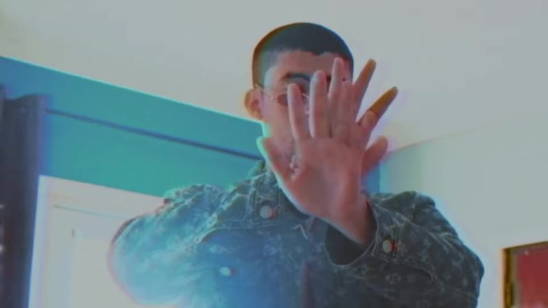 Louis Vuitton x Supreme Denim Shirt Worn by Bad Bunny in Louis Vuitton x Supreme Denim Shirt Worn by Bad Bunny in