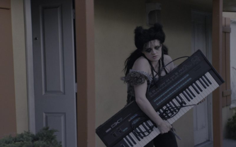 Yamaha DX7 Synthesizer Held by Gayle Rankin (Sheila the She-Wolf) in Glow Season 1 Episode 10 (1)