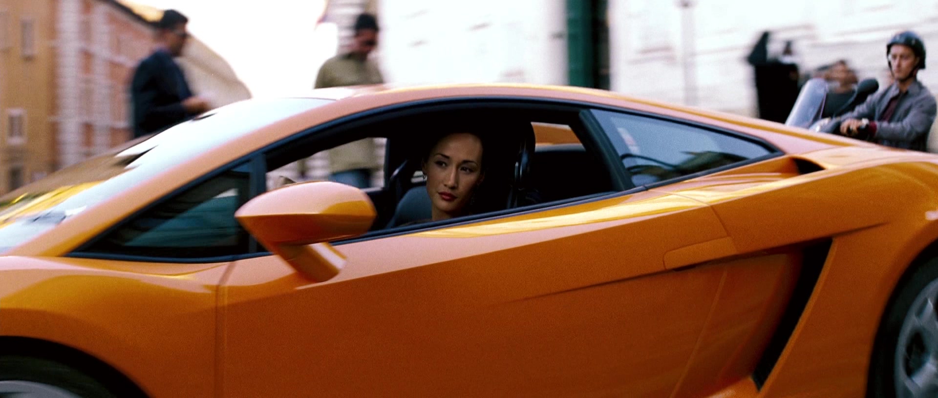 Casos de Famíla  Lamborghini-Gallardo-Orange-Sports-Car-Driven-by-Maggie-Q-in-Mission-Impossible-2