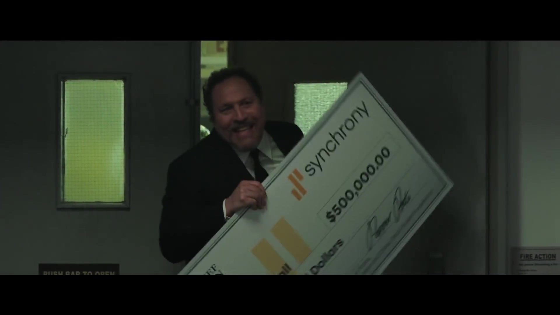 Synchrony Bank Big Check Held by Jon Favreau in Spider-Man: Far From Home (2019) Movie1920 x 1080