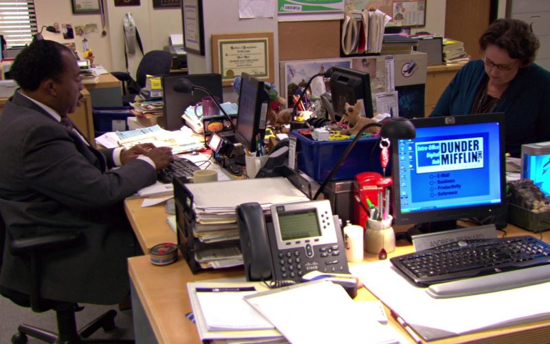 HP Computer Monitors and Cisco Phone in The Office