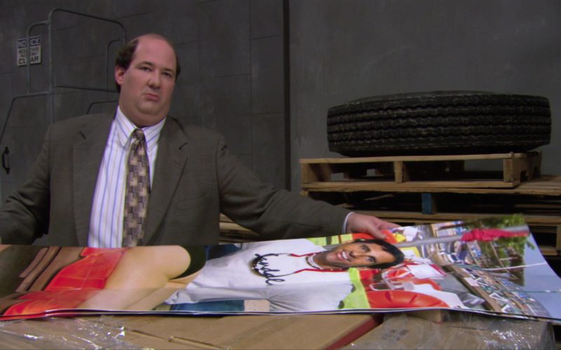 Sandals Resorts International Poster Held by Brian Baumgartner (Kevin Malone) in The Office – Season 3, Episode 12 (1)