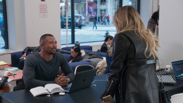 Charles Michael Davis et al. sitting at a desk