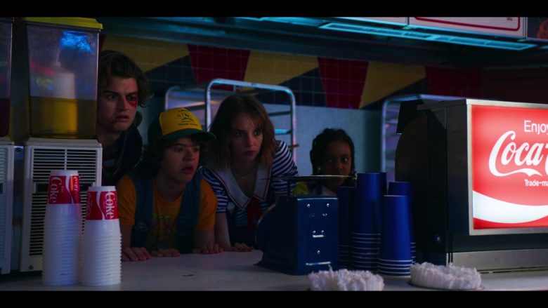 Gaten Matarazzo et al. sitting at a table 