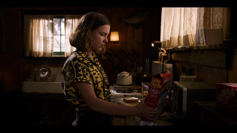 Millie Bobby Brown standing in a kitchen
