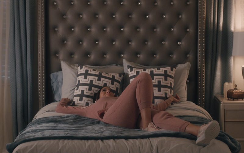 A person lying on a bed