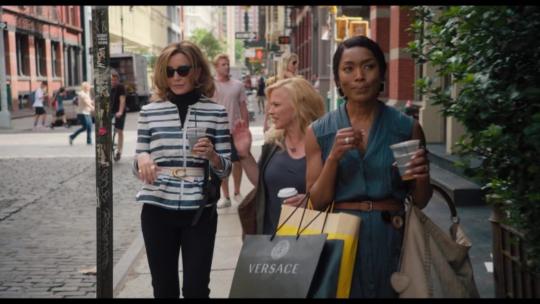 Versace Black Store Paper Bag Held By Angela Bassett In Otherhood (2019)