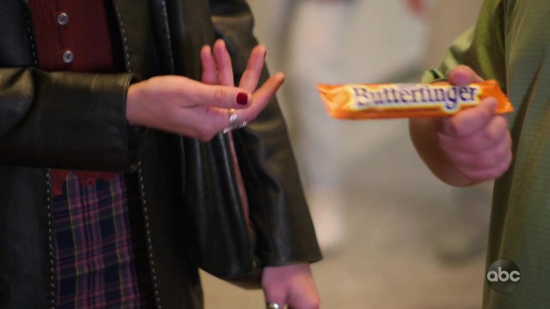 Butterfinger Candy Bar Held by AJ Michalka as Lainey Lewis in Schooled (2)