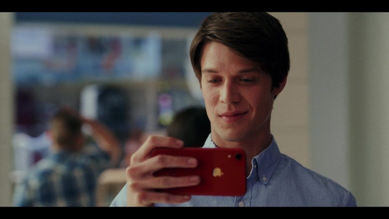 Apple iPhone Red Mobile Phone Held by Colin Ford as Josh Wheeler in Daybreak Season 1 Episode 2