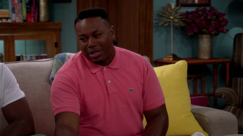 Lacoste Pink Polo Shirt Worn by Marcel Spears as Martin Lawrence Butler in The Neighborhood (5)