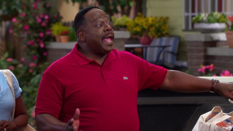 Lacoste Red Polo Shirt Worn by Cedric the Entertainer as Calvin Butler in The Neighborhood (1)