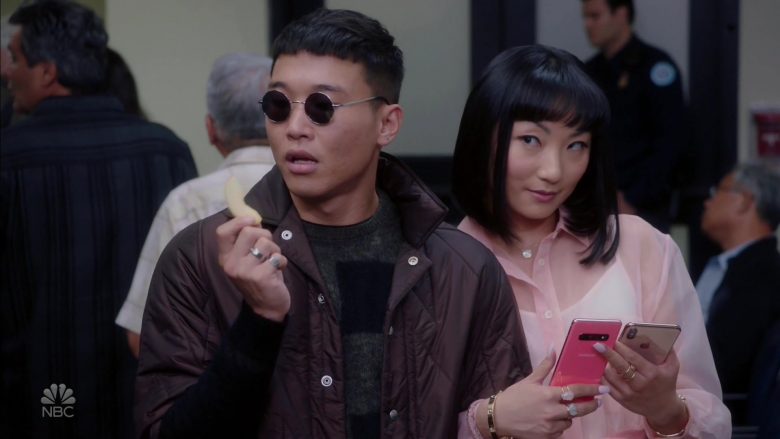 Samsung Galaxy and Apple iPhone Smartphones Held by Joel Kim Booster as Jun Ho (2)