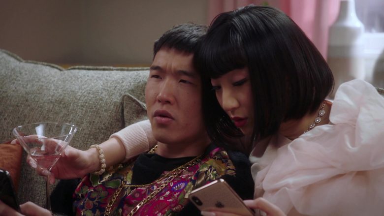 Apple iPhone Mobile Phone Used by Poppy Liu as Mei Lin in Sunnyside Season 1 Episode 9