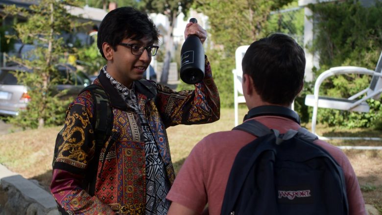 Freixenet Sparkling Wine Bottle Held by Nik Dodani as Zahid in Atypical Season 3 Episode 4 (1)
