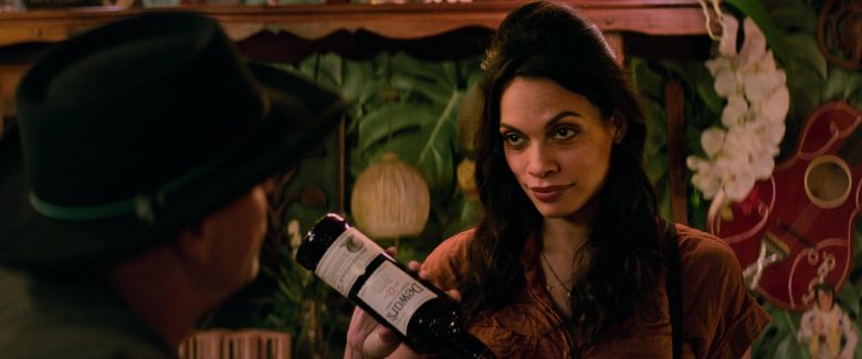 Dewar’s 12 Year Aged Scotch Whisky Bottle Held by Rosario Dawson as Nevada in Zombieland Double Tap (2)
