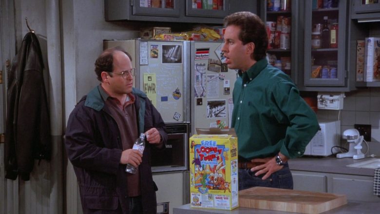 Evian Water Bottle Held by Jason Alexander as George Costanza in Seinfeld Season 7 Episode 17 The Doll