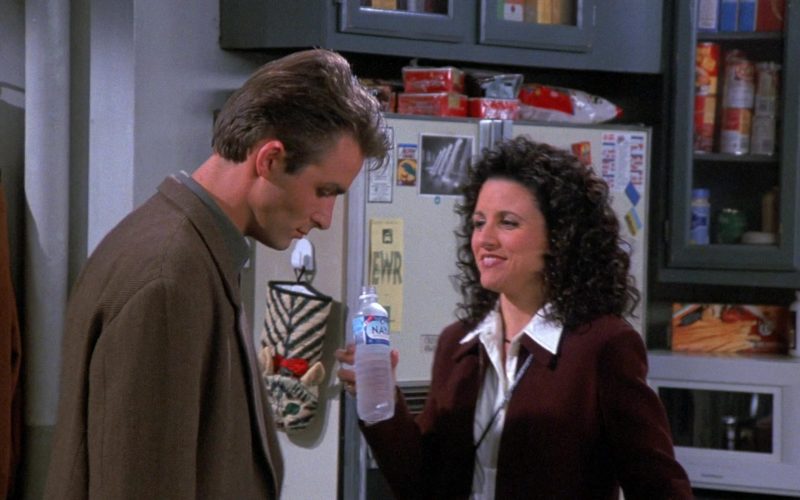Naya Water Enjoyed by Julia Louis-Dreyfus as Elaine Benes in Seinfeld Season 8 Episode 7 The Checks (1)