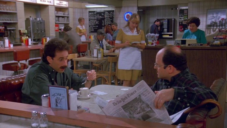 The New York Times Newspaper Held by Jason Alexander as George Costanza in Seinfeld Season 9 Episode 1 The Butter Shave