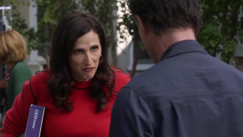 Geotoys Puzzle Held by Michaela Watkins as Delia in The Unicorn Season 1 Episode 11 If It Doesn't Spark Joy (1)