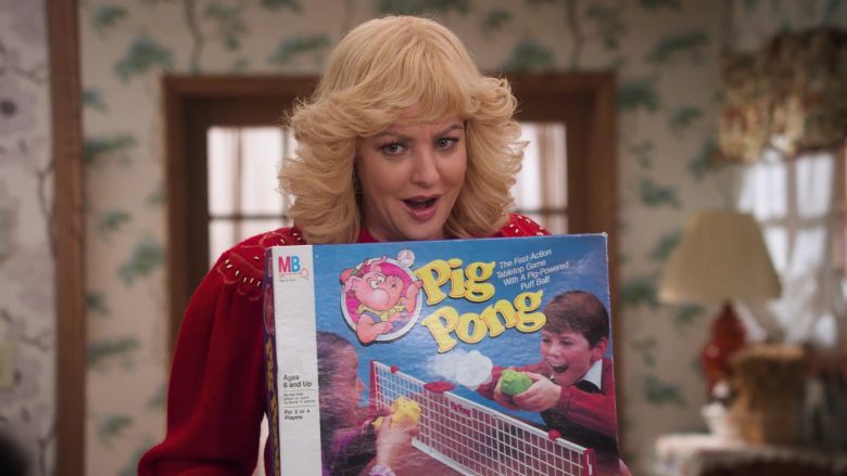 Milton Bradley Pig Pong Game Held by Wendi McLendon-Covey as Beverly in The Goldbergs Season 7 Episode 12 Game Night (2020)
