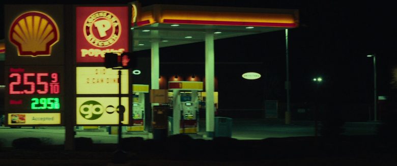Shell Filling Station and Popeyes Sign in Dark Waters (2019)