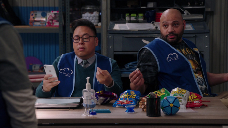 Apple iPhone White Smartphone Held by Nico Santos in Superstore S05E19