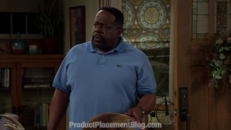 Lacoste Blue Polo Shirt of Cedric the Entertainer as Calvin Butler in The Neighborhood S02E20 (1)