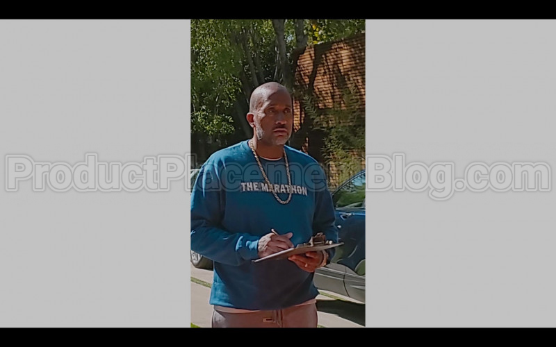 The Marathon Blue Sweatshirt of Kenya Barris in #blackAF S01E01 "because of slavery" (2020)