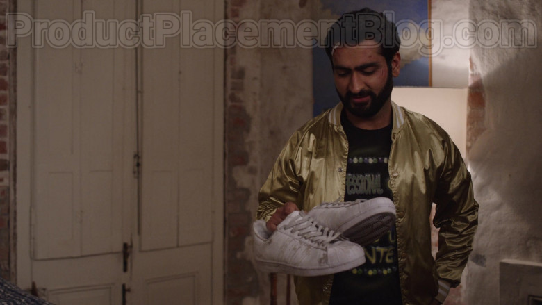 Adidas Superstar White Shoes Held by Kumail Nanjiani in The Lovebirds (2020)