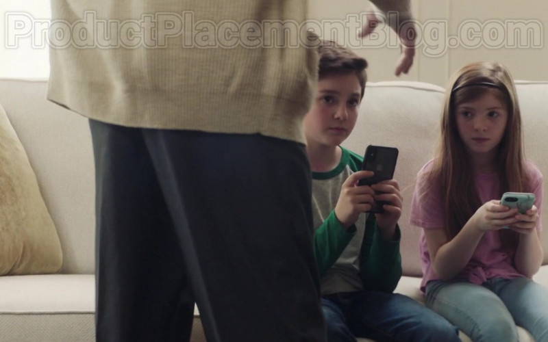 Evan Assante as Peter Using Apple iPhone Smartphone in Adventures of Rufus The Fantastic Pet (2020) Movie