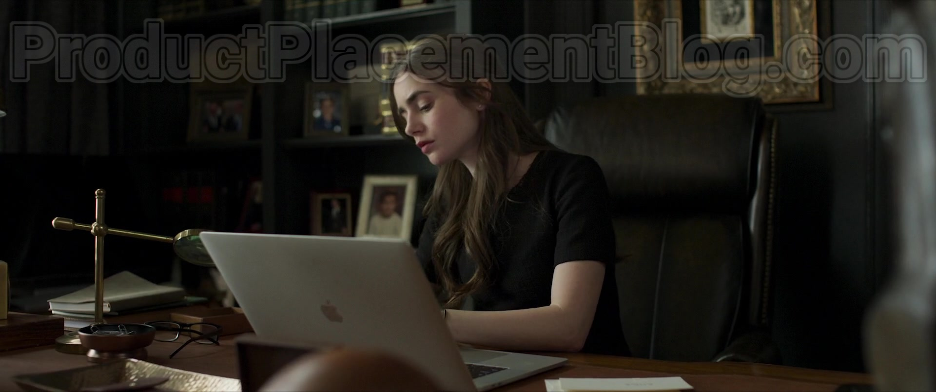 Apple MacBook Pro Laptop of Lily Collins as Lauren Monroe in Inheritance (2...