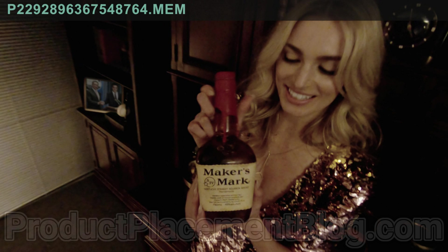 Maker's Mark Handmade Kentucky Straight Bourbon Whisky Bottle Held By