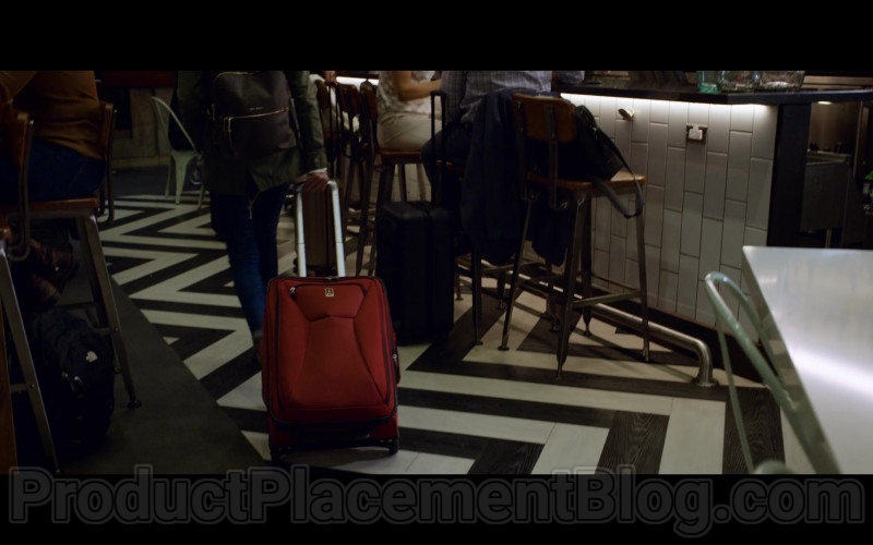 Travelpro Red Luggage in The Wrong Missy (2020)