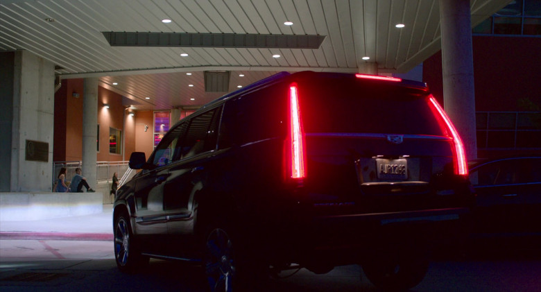 Actors Driving Cadillac Escalade Car in Think Like a Dog (2020)