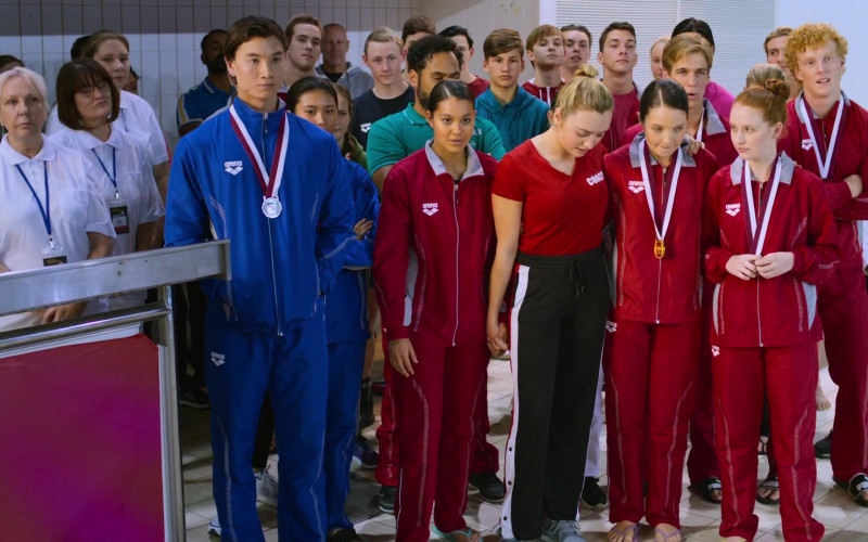 Arena Red Tracksuits Outfits of Actors in Swimming for Gold