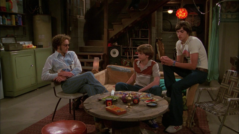 Ashton Kutcher as Michael Kelso Wears Adidas White Sneakers, Jeans and T-Shirt Outfit in That '70s Show