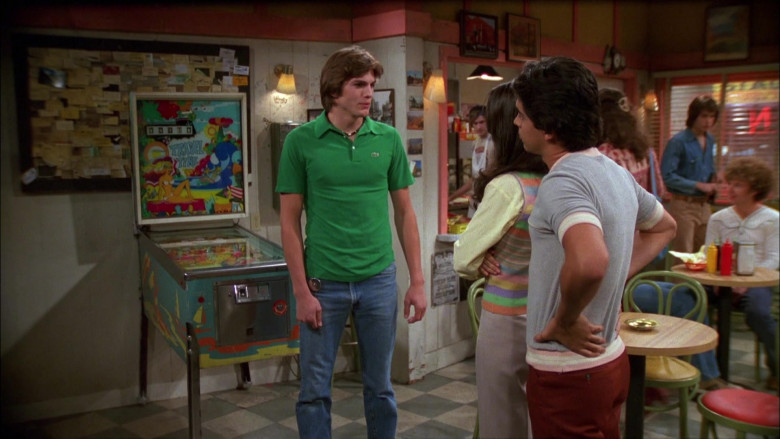 Ashton Kutcher as Michael Wears Lacoste Green Shirt and Classic Jeans Outfit in That '70s Show (1)