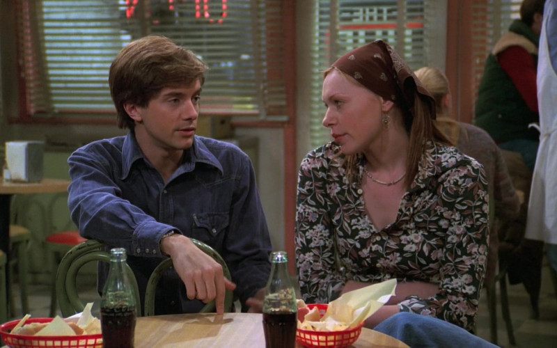 Coca-Cola Soda Drinks Enjoyed by Topher Grace as Eric Forman & Laura Prepon as Donna Pinciotti in That '70s Show