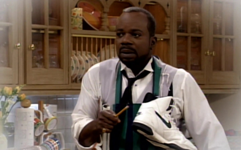 Nike Shoes Held by Joseph Marcell as Geoffrey Butler