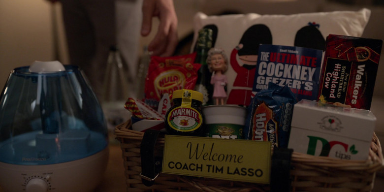Pro Breeze, Marmite Yeast Extract, Walkers Shortbread Highland Cow Carton in Ted Lasso S01E01