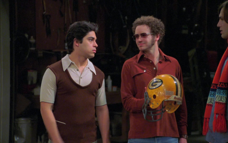 Riddell American Football Yellow Helmet Held by Danny Masterson as Steven Hyde in That '70s Show S06E22 "Sparks" (2004)