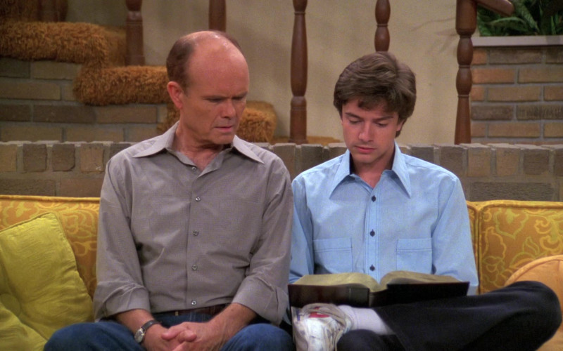 Topher Grace as Eric Wears Nike Sneakers, Blue Shirt and Black Jeans Outfit in That '70s Show
