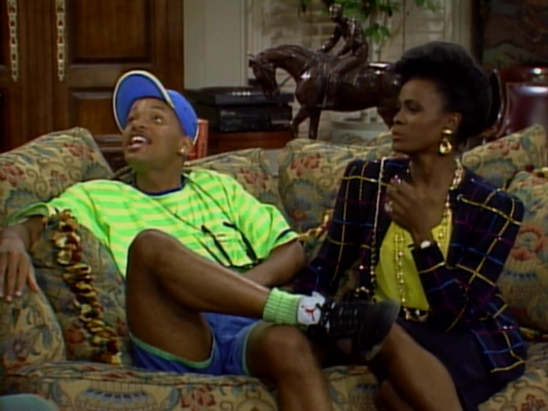 Will Smith Wears Air Jordan Black Sneakers, Green T-Shirt and Blue Shorts Outfit (1)