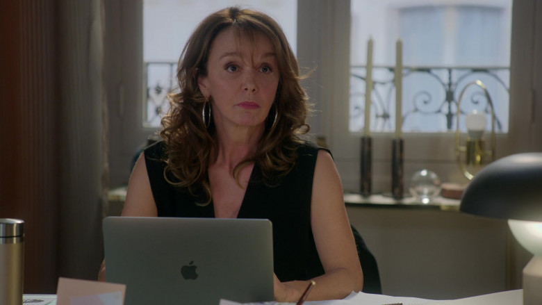 Apple MacBook Laptop of Philippine Leroy-Beaulieu as Sylvie in Emily in Paris – Season 1 Ep. 1 (2020)