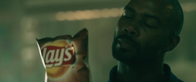 Lay's Chips Held by Omari Hardwick as Marquis T. Woods in Spell 2020 Movie (2)